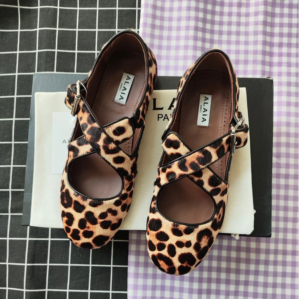 Alaia Leopard-Print Mary Jane Flats in Brown and Black